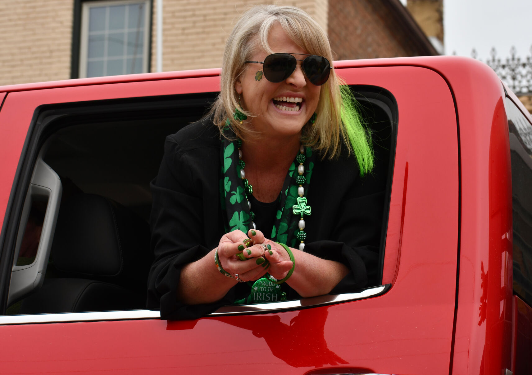 A woman prepares to toss candy